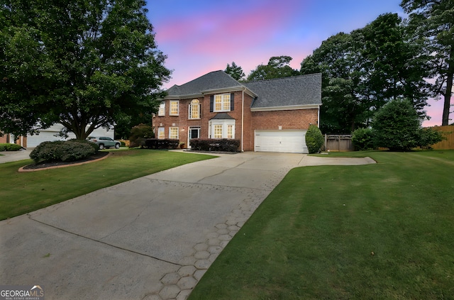 285 Finsbury Park Ct, Suwanee, GA 30024 - view of front of house with driveway, brick siding, roof with shingles, and a garage