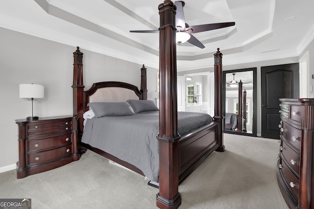 285 Finsbury Park Ct, Suwanee, GA 30024 - bedroom with a raised ceiling, light carpet, ornamental molding, and a ceiling fan