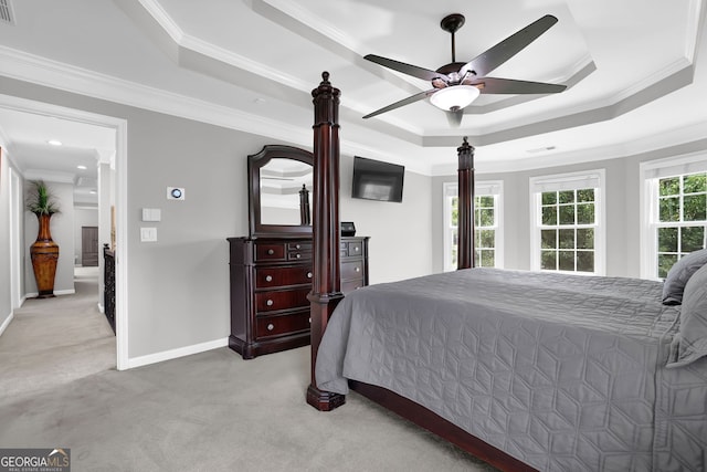 285 Finsbury Park Ct, Suwanee, GA 30024 - bedroom featuring light colored carpet, a tray ceiling, ornamental molding, ceiling fan, and baseboards