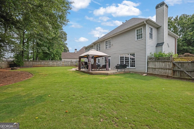 285 Finsbury Park Ct, Suwanee, GA 30024 - back of property featuring a gazebo, a deck, and a chimney