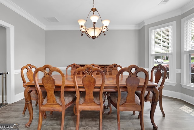 285 Finsbury Park Ct, Suwanee, GA 30024 - dining room featuring crown molding, baseboards, a chandelier, and wood finished floors