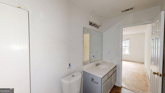 176 Silver Fox Trl, Dallas, GA 30157 - half bathroom featuring toilet and vanity