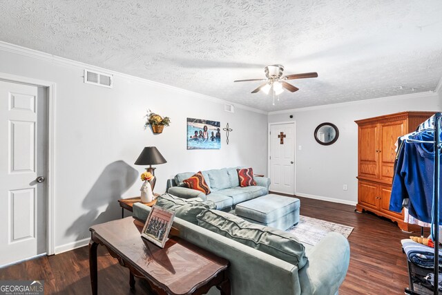 6628 Londonderry Dr, Morrow, GA 30260 - living room featuring dark wood finished floors, ceiling fan, baseboards, a textured ceiling, and crown molding
