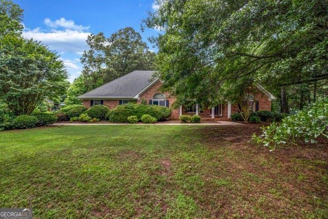 362 Clyde Ct, Mcdonough, GA 30252 - view of front of home featuring a front yard