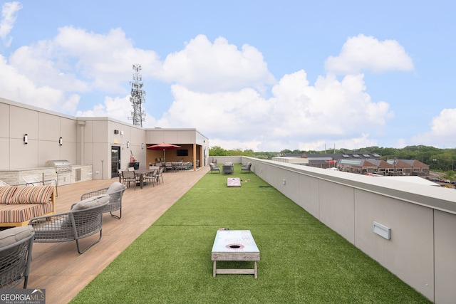 112 Rogers St NE Unit 304, Atlanta, GA 30317 - view of property's community with a yard, an outdoor kitchen, outdoor dining space, and a patio