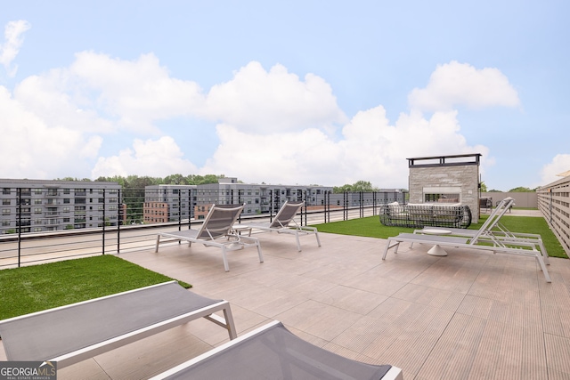 112 Rogers St NE Unit 304, Atlanta, GA 30317 - view of patio featuring a fireplace