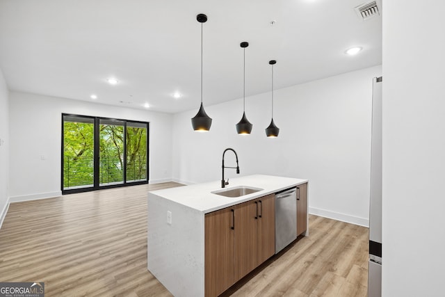 112 Rogers St NE Unit 304, Atlanta, GA 30317 - kitchen featuring a sink, dishwasher, light wood-style floors, an island with sink, and recessed lighting