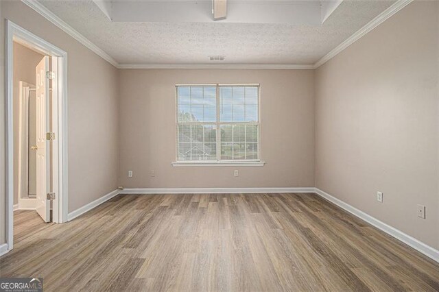 1501 Buckingham Pl, Stockbridge, GA 30281 - unfurnished room featuring wood finished floors and a textured ceiling