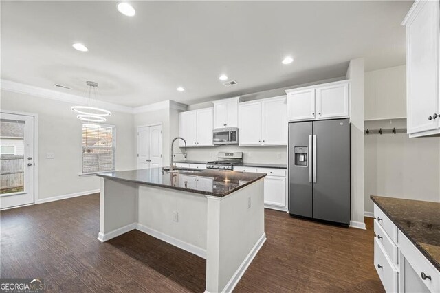 303 Orange Cir, Dawsonville, GA 30534 - kitchen with appliances with stainless steel finishes, a sink, crown molding, dark wood-type flooring, and white cabinets
