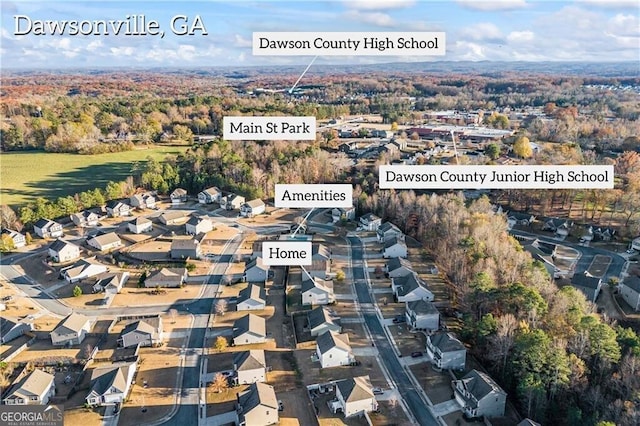 303 Orange Cir, Dawsonville, GA 30534 - aerial view of property and surrounding area with a heavily wooded area and nearby suburban area