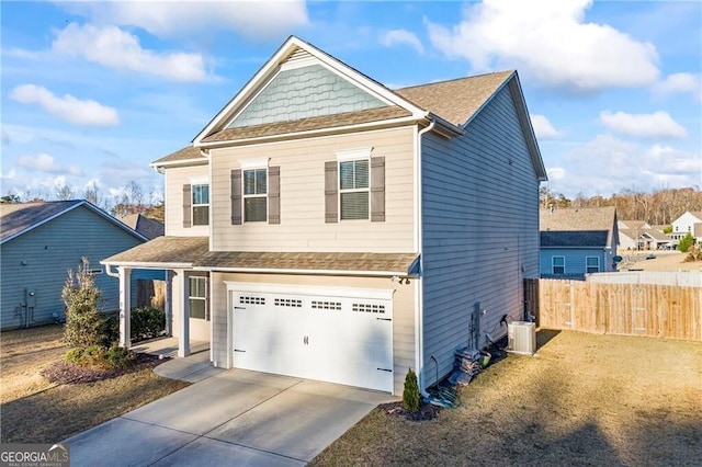 303 Orange Cir, Dawsonville, GA 30534 - craftsman house featuring an attached garage, driveway, central AC, and a shingled roof