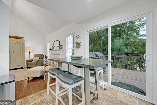 5421 Amherst Way, Flowery Branch, GA 30542 - dining space featuring lofted ceiling