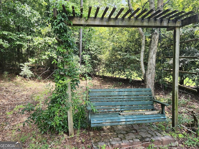 1129 River Green Ct, Mcdonough, GA 30252 - wooden deck with a pergola