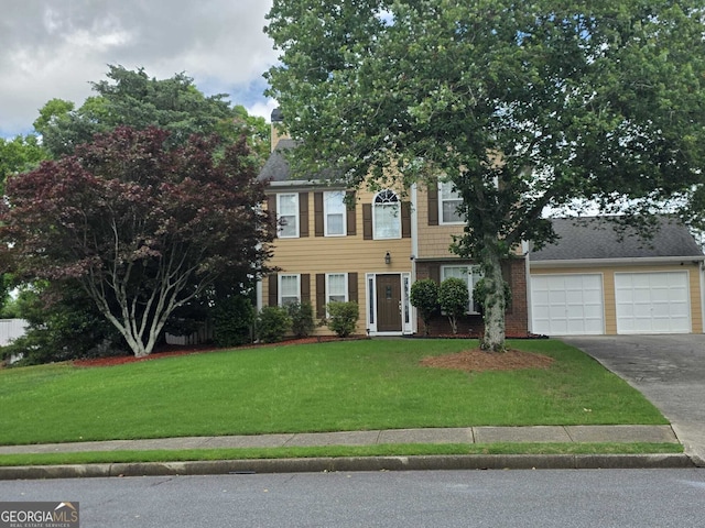 1405 Overland Xing, Alpharetta, GA 30004 - colonial inspired home featuring asphalt driveway, a front lawn, an attached garage, and a chimney