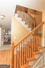 1405 Overland Xing, Alpharetta, GA 30004 - stairway with wood finished floors