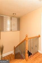 1405 Overland Xing, Alpharetta, GA 30004 - staircase with wood finished floors, baseboards, and radiator heating unit