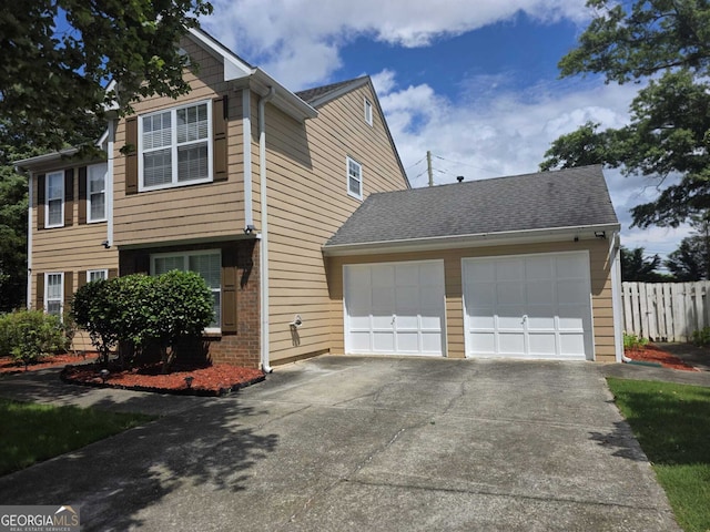 1405 Overland Xing, Alpharetta, GA 30004 - view of front of house with a garage and driveway