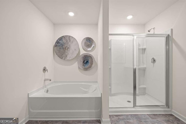 1311 Aura Ln, Lawrenceville, GA 30045 - full bath with a stall shower and a garden tub