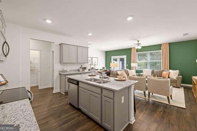 1311 Aura Ln, Lawrenceville, GA 30045 - kitchen featuring gray cabinets, stainless steel dishwasher, dark wood-style floors, ceiling fan, and a kitchen island with sink