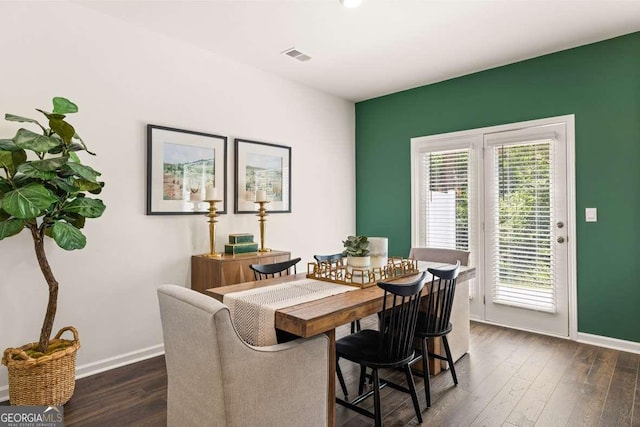 1311 Aura Ln, Lawrenceville, GA 30045 - dining room with baseboards and dark wood finished floors