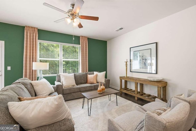 1311 Aura Ln, Lawrenceville, GA 30045 - living room featuring a ceiling fan and wood finished floors