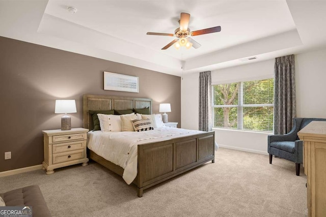 1311 Aura Ln, Lawrenceville, GA 30045 - bedroom with a raised ceiling, light colored carpet, and ceiling fan