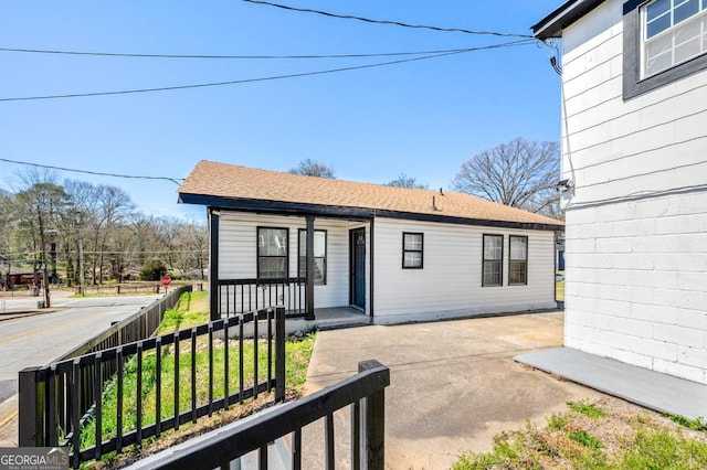 2110 Newnan St, Atlanta, GA 30344 - view of front of home with a porch and a shingled roof