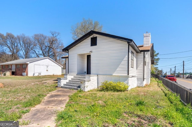2110 Newnan St, Atlanta, GA 30344 - view of front of home featuring a chimney