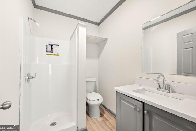 2110 Newnan St, Atlanta, GA 30344 - full bath featuring crown molding, a stall shower, vanity, and wood finished floors