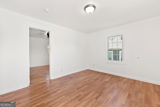 2110 Newnan St, Atlanta, GA 30344 - empty room featuring light wood-type flooring and a smoke detector