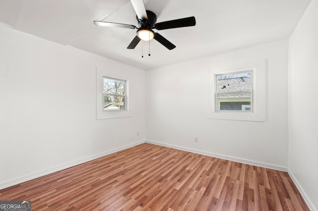 2110 Newnan St, Atlanta, GA 30344 - unfurnished room with light wood-style flooring and baseboards
