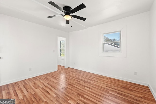 2110 Newnan St, Atlanta, GA 30344 - unfurnished room featuring light wood-style floors and ceiling fan