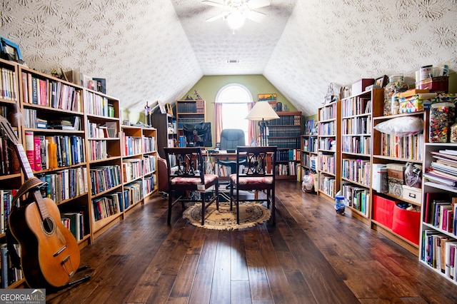 1612 Cagle Ct, Lawrenceville, GA 30045 - home office featuring wall of books, a ceiling fan, hardwood / wood-style flooring, and vaulted ceiling