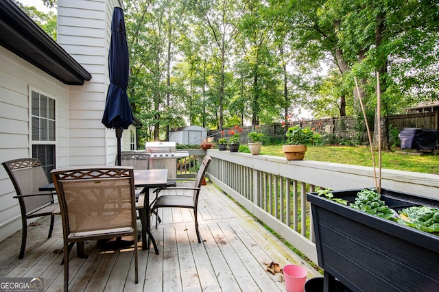 1612 Cagle Ct, Lawrenceville, GA 30045 - deck with outdoor dining area and a grill