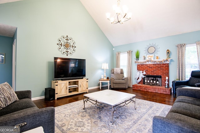 1612 Cagle Ct, Lawrenceville, GA 30045 - living area with a chandelier, high vaulted ceiling, baseboards, wood finished floors, and a fireplace