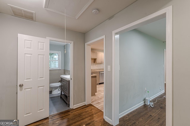 489 Radar Dr, Hapeville, GA 30354 - corridor with attic access and dark wood-type flooring