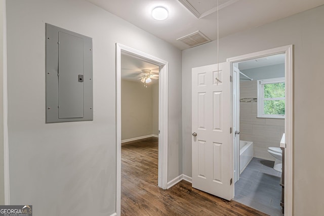 489 Radar Dr, Hapeville, GA 30354 - hallway with attic access, electric panel, wood finished floors, and baseboards