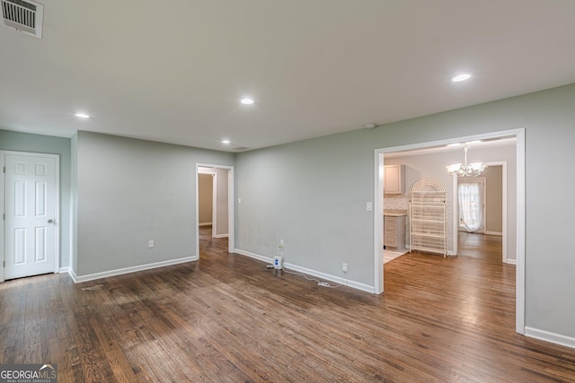 489 Radar Dr, Hapeville, GA 30354 - unfurnished room with baseboards, dark wood-type flooring, a chandelier, and recessed lighting