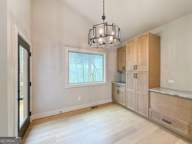 54 Myna, Ellijay, GA 30540 - unfurnished dining area featuring a chandelier, light wood-style flooring, and high vaulted ceiling