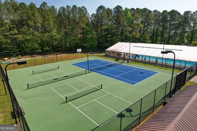 54 Myna, Ellijay, GA 30540 - view of tennis court with a view of trees