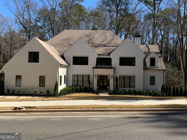 1303 Cobblemill Way NW, Kennesaw, GA 30152 - french provincial home featuring a chimney and stucco siding