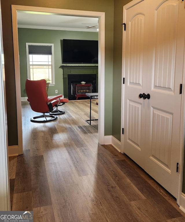 556 Constitution Dr, Forsyth, GA 31029 - hallway with crown molding, wood finished floors, and baseboards