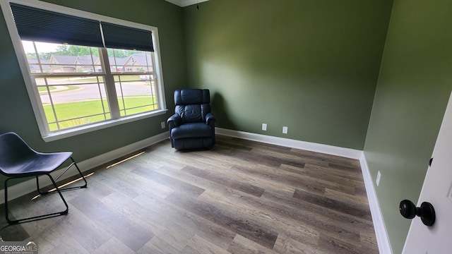 556 Constitution Dr, Forsyth, GA 31029 - sitting room featuring wood finished floors and baseboards