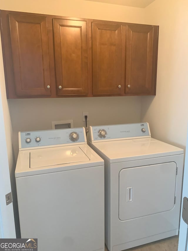 2118 Water Mill Ct, Buford, GA 30519 - laundry area with washer and dryer and cabinet space