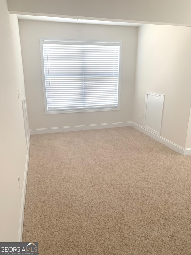 2118 Water Mill Ct, Buford, GA 30519 - unfurnished room featuring carpet, baseboards, and healthy amount of natural light