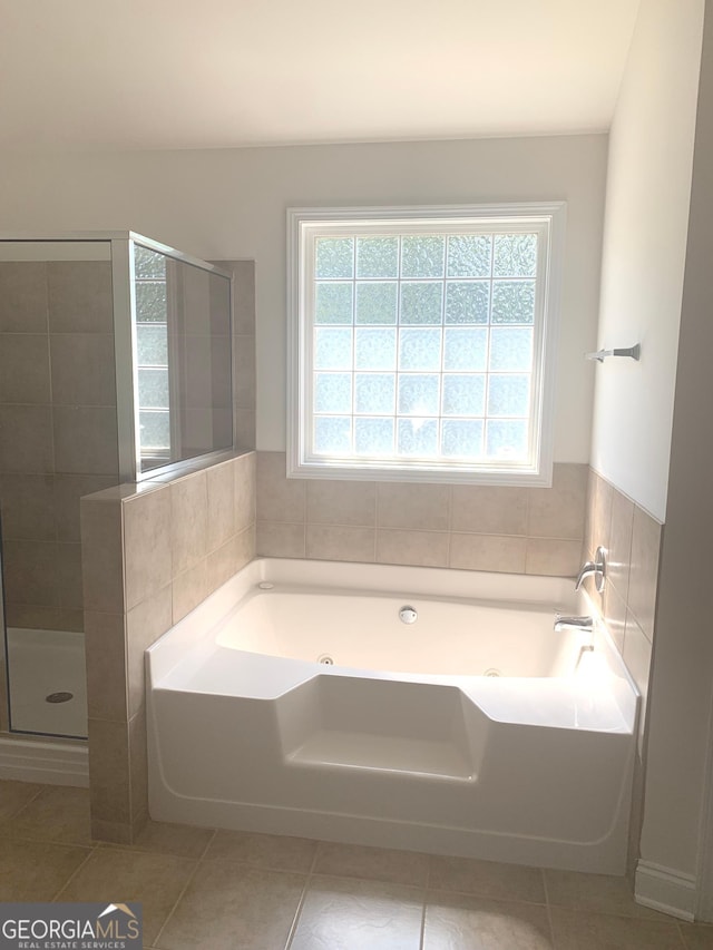 2118 Water Mill Ct, Buford, GA 30519 - full bath featuring a whirlpool tub, tile patterned flooring, and tiled shower