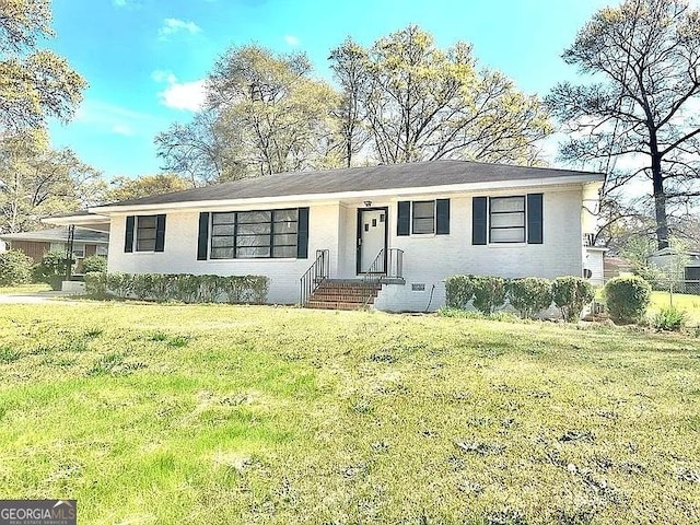 103 Wilson Way, Thomaston, GA 30286 - view of front facade with a front lawn