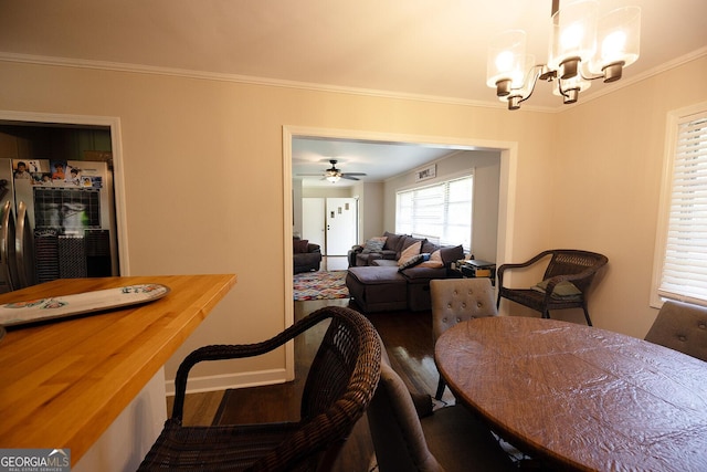 103 Wilson Way, Thomaston, GA 30286 - dining area featuring a chandelier, wood finished floors, and ornamental molding