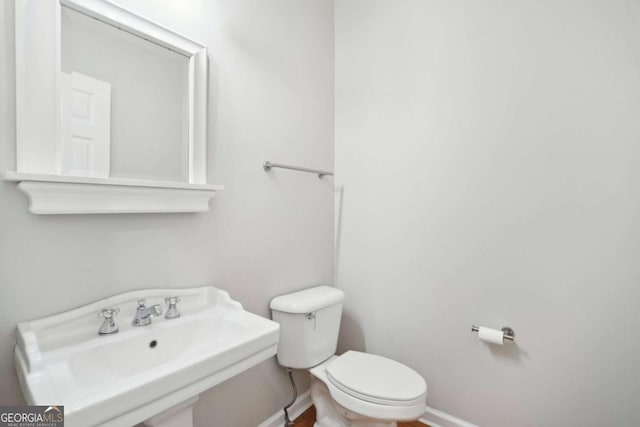 220 Chinkapin Cir SW, South Fulton, GA 30311 - bathroom with a sink and toilet