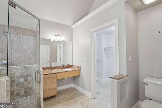 220 Chinkapin Cir SW, South Fulton, GA 30311 - bathroom with a shower stall, tile patterned floors, vanity, and a walk in closet